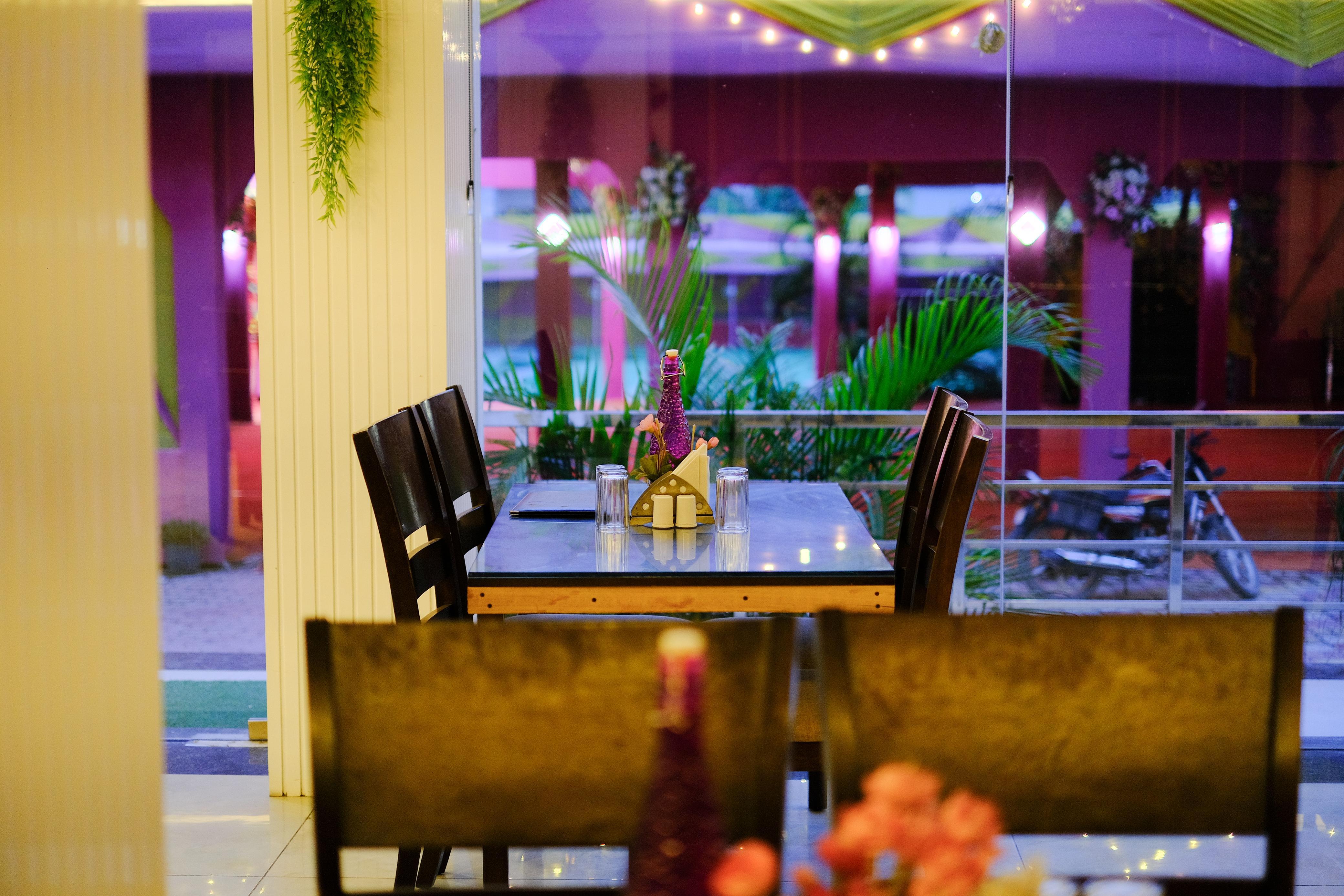 Cozy Table Setting with Lawn View